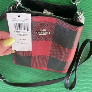 Coach mini purse. New with tags. Never carried. Just too small for me.